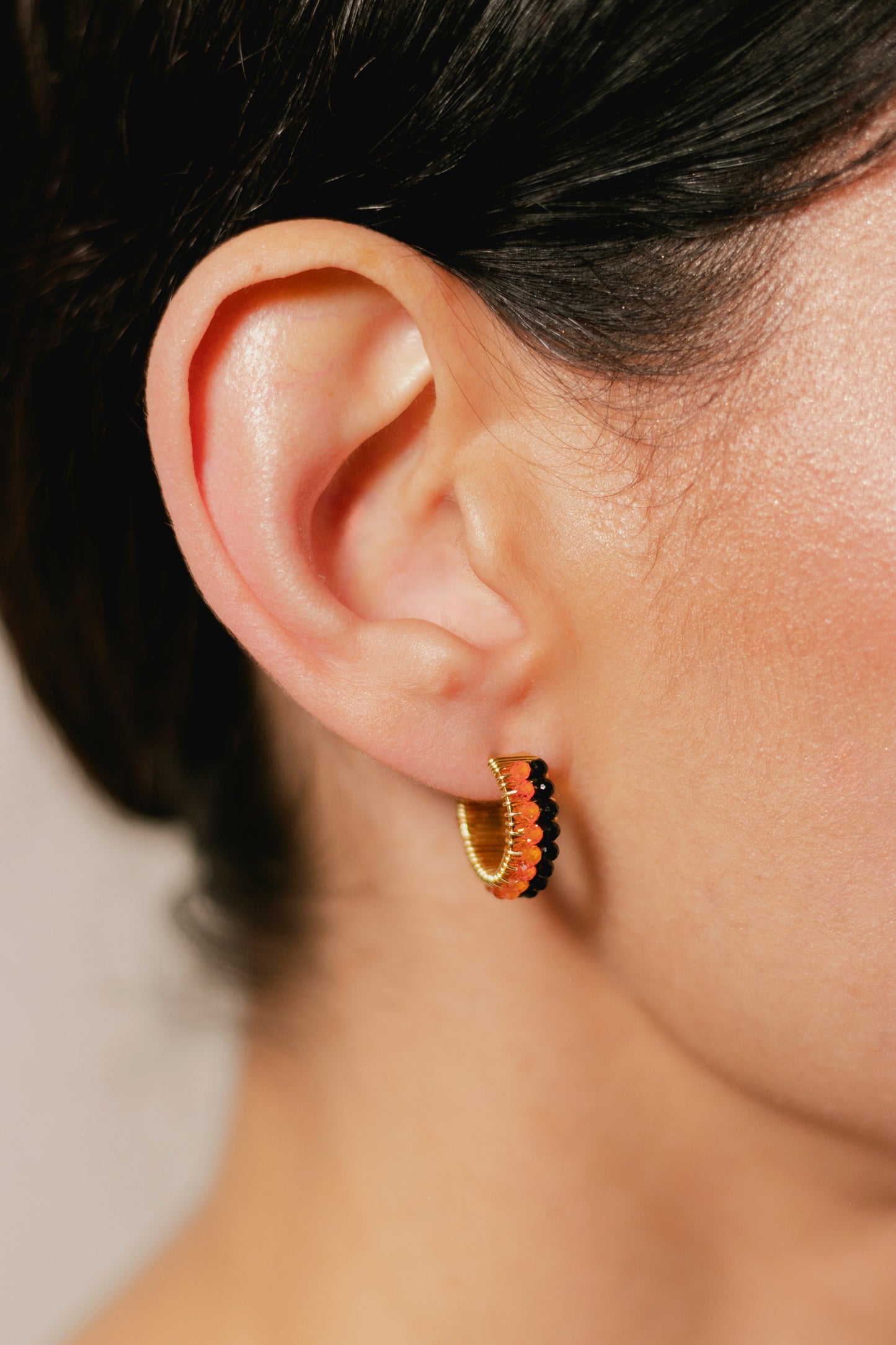 ARRACADA ABANICO DOBLE- NEGRO/NARANJA